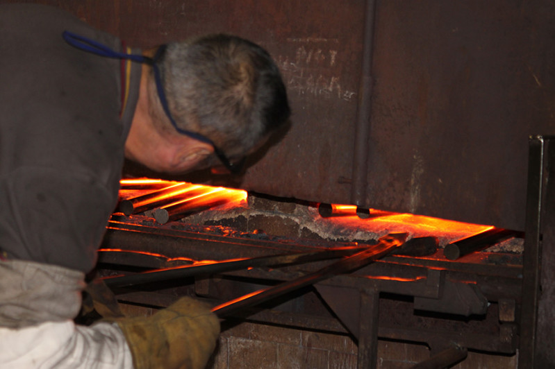 Heating metals for closed-die forging